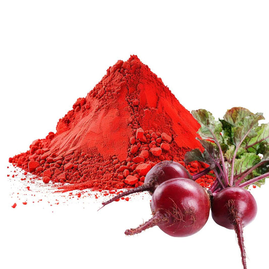 Heaped pile of vibrant red Beetroot powder with fresh whole beetroots on a white background - WowNutri