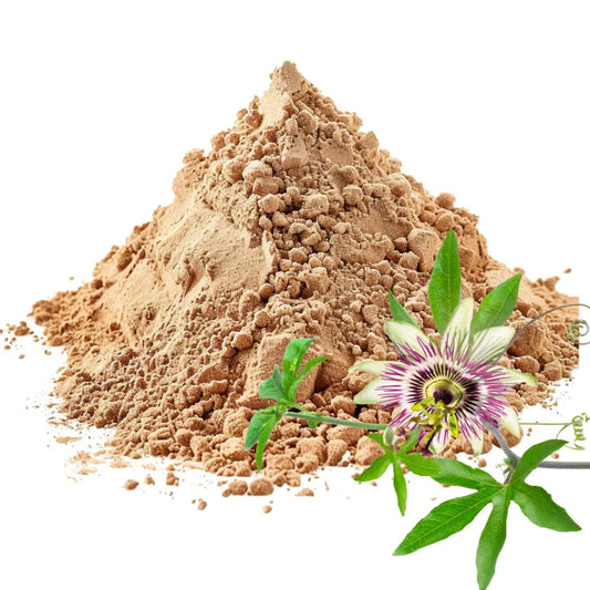 Heaped pile of Passion Flower herb powder with a vibrant Passion Flower and green leaves on a white background - WowNutri